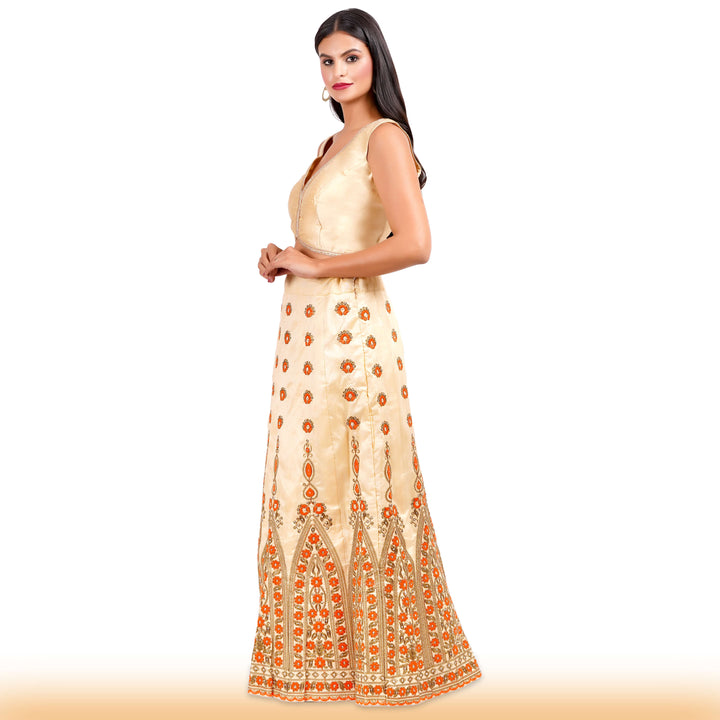 Beige Embroidered lehenga with orange embroidery and contrast duppatta