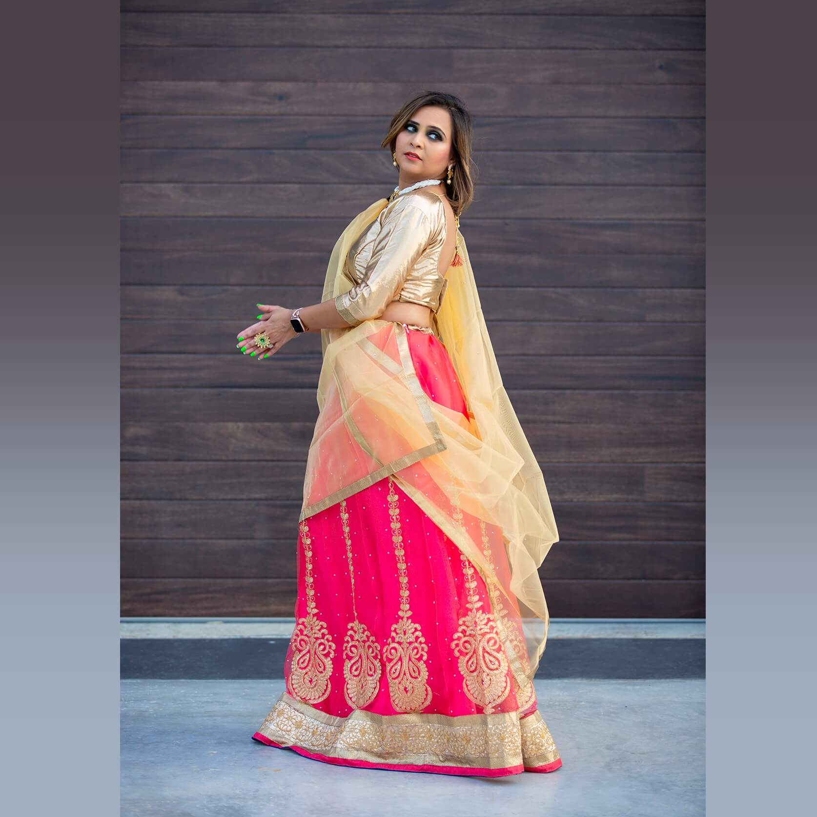 Photo of White and Pink Bridal Lehenga with Gold Blouse